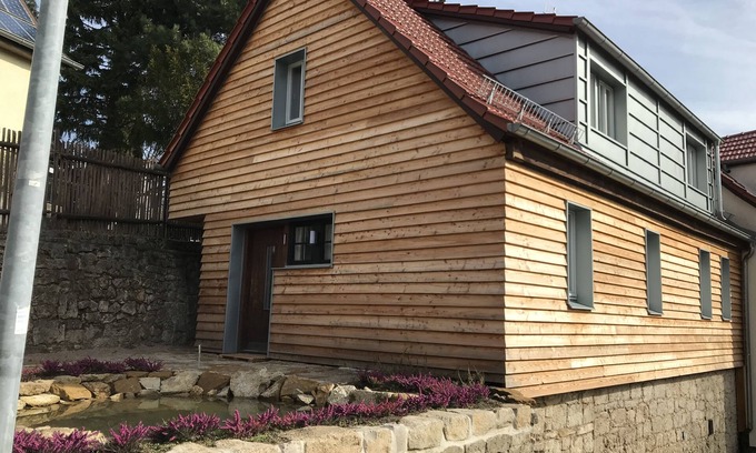 Weimar House | Wooden house on the wall - 100 sqm