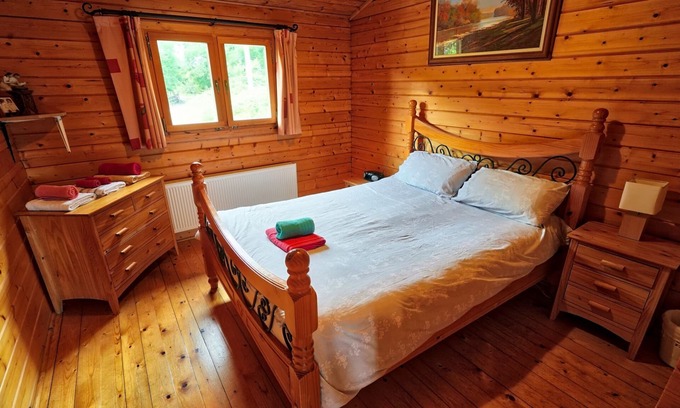 Clarinbridge House | Wooden log cabin entirely place