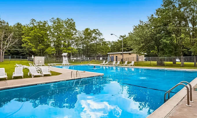 Albrightsville House | Woodland cabin in gated community with firepit, pools, tennis & lake beach