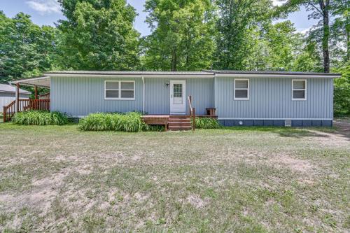 Mancelona House | Woodsy 20-Acre Retreat with Hot Tub in Mancelona