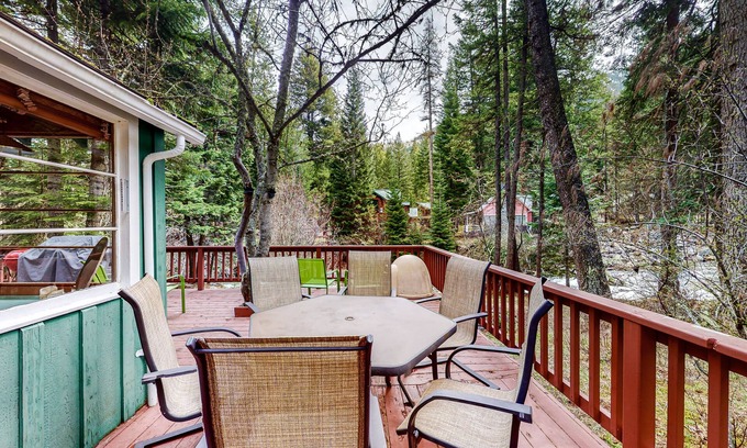 Wallowa County Cabin | Woodsy riverfront basecamp with fireplace, large deck & firepit - dogs welcome