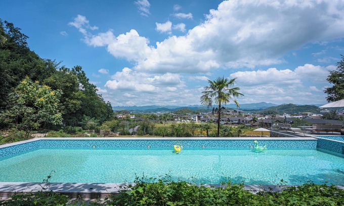 Huaxi Hotel | Xunmiri Qinin Villa