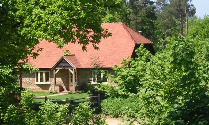 Graffham House | Yaffle Cottage. Home comfort in an idyllic woodland location
