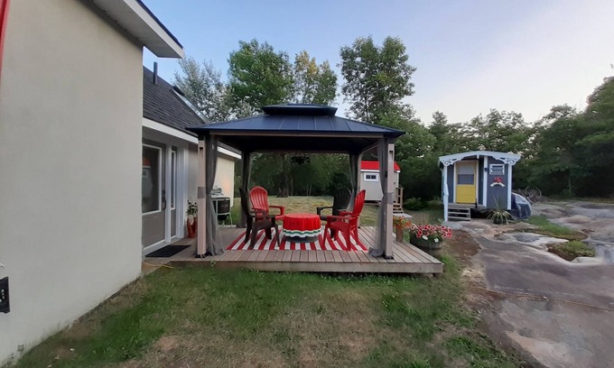 Whitefish Falls Cabin | Yellow Door - Cabinn" Off The Grid"nSurrounded by Mountains, Lakes & Nature nn
