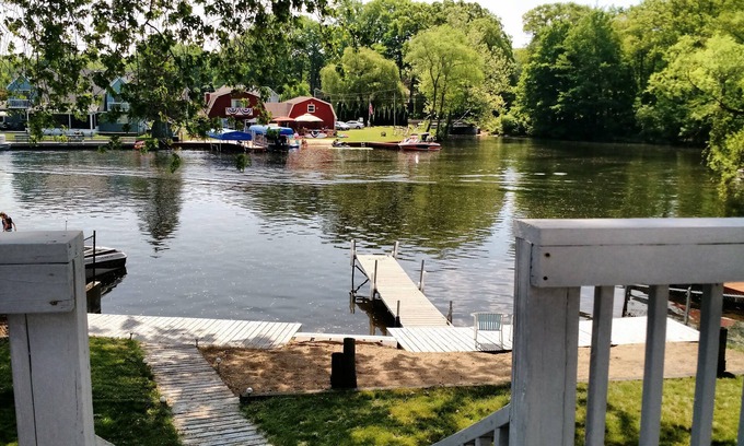 Coloma House | You'll love sipping a drink on the deck while enjoying views of Paw Paw Lake.