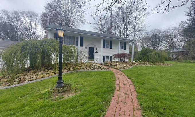 Conneaut Lake Apartment | Your Conneaut Lake Getaway: Comfy 3BR Duplex, Hot Tub, Fenced Yard!