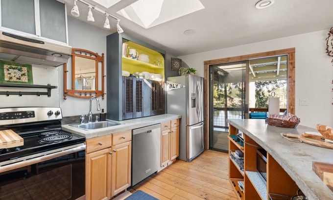 Lacey House | Your eclectic escape! Lakefront home in Lacey w/private patios and dock