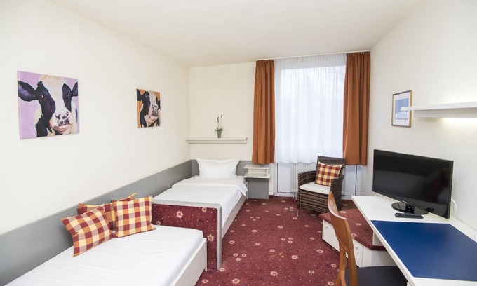 Muehlhausen im Taele House | Zentral an der A8