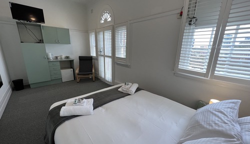 Queen Room with Shared Bathroom