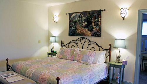 Anna's Garden Room with 1 King and 1 Sofa Bed, Patio, and Pond view