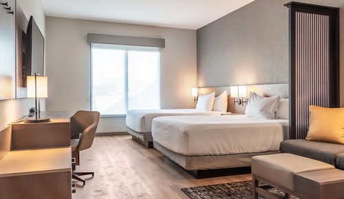Two Queen Beds with Sofa Bed