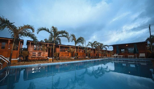 Luxurious Wooden Cottages with Pool View