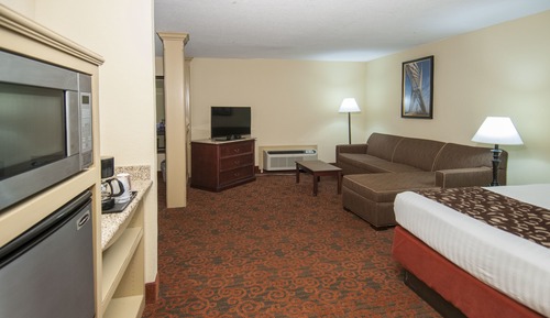 Executive King Suite/Separate Living Room & Full Size Bed