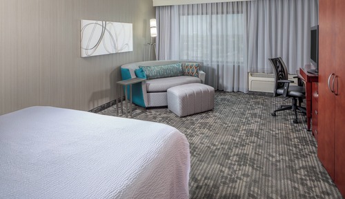 King Room with Sofa Bed and Roll-in Shower - Mobility/Hearing Accessible