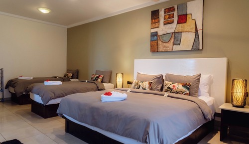 Sunset Suite with Beachfront Balcony