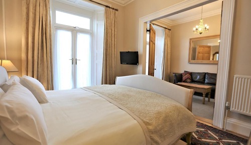 Luxury Suite, 1 Bedroom, Ground Floor. Balcony access with large bathroom. 