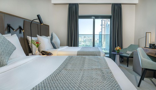 DELUXE KB OR TWN BED W/ BALCONY LAGOON VIEW