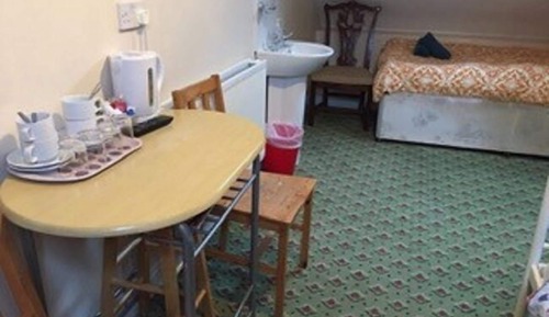 Economy Quadruple Room, Shared Bathroom