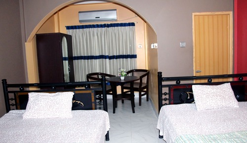 Deluxe Quadruple Room, Multiple Beds, Smoking, Garden View