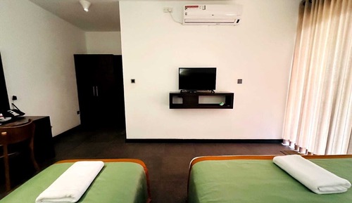 Deluxe Triple Room
