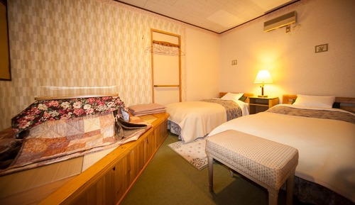 Condominium type with private bath, toilet and kitchenette (Non Smoking)