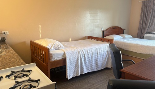 Room, Non Smoking, Kitchenette (1 King and 2 Full Beds)
