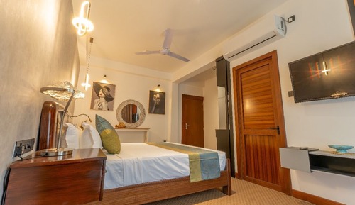 Deluxe Triple Room, Balcony, Garden View
