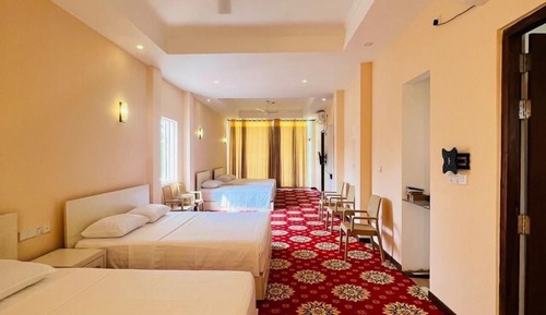 Deluxe Triple Room, Balcony, Garden View