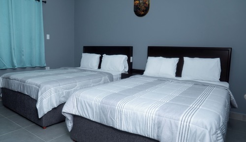 Exclusive Suite, Multiple Beds, Kitchenette, Courtyard View