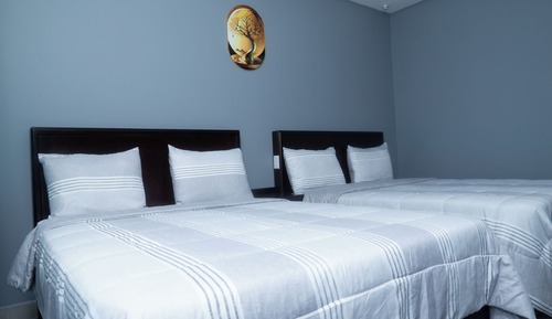 Exclusive Suite, Multiple Beds, Kitchenette, Courtyard View