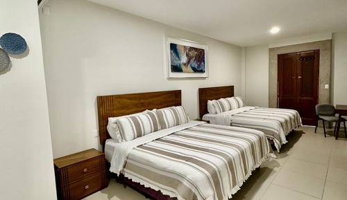 Deluxe Quadruple Room, Balcony, City View