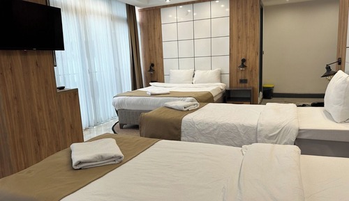 Deluxe Quadruple Room, City View