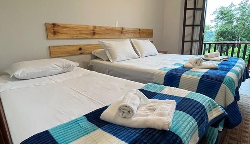 SUITE SUPERIOR TRIPLA COM SACADA E VISTA