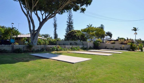 Standard Powered Slab Site - with Shared Bathroom. Bring your own Caravan or Tent