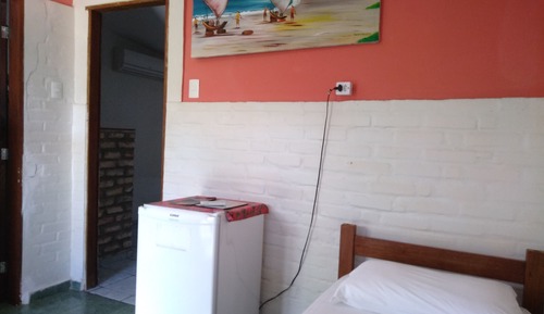 Family Double Room, 2 Bedrooms, Shared Bathroom, Courtyard Area (Chalé família triplo )