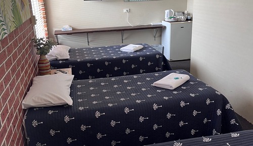 Room (1 Double & 3 Single Beds)