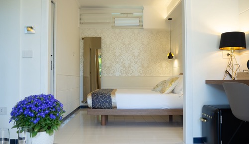 Quadruple room with patio