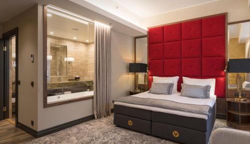 Deluxe Room with access to the V Spa water and sauna area