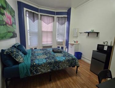 Queen Room with Shared Bathroom