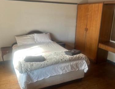 Queen Room with Shared Bathroom