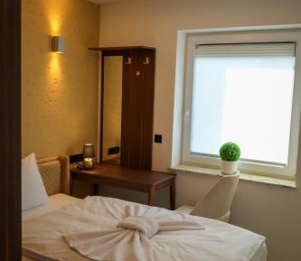 Three-Bedroom Apartment with Balcony