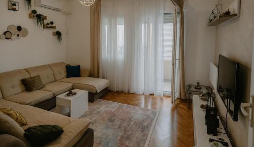 One-Bedroom Apartment with Balcony and City View