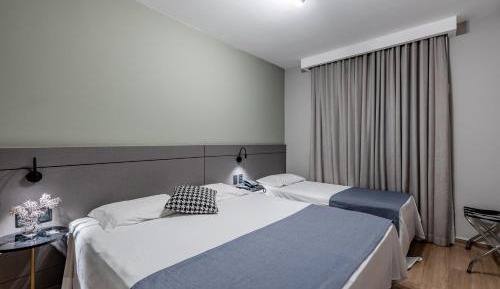 Deluxe Triple Room (1 Double Bed + 1 Single Bed)
