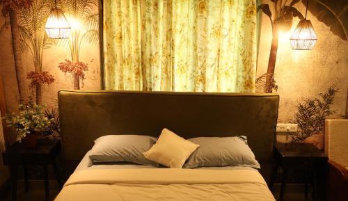 Deluxe One-Bedroom Apartment with Garden View