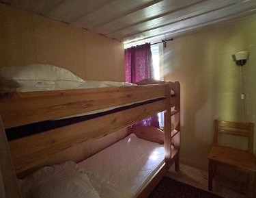 Single Bed in Dormitory Room