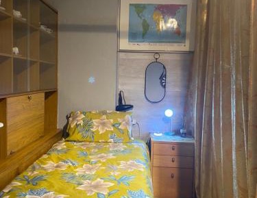 Single Bed in Dormitory Room