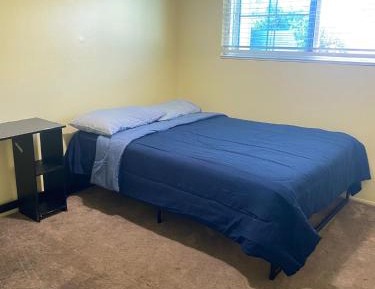 Queen Room with Shared Bathroom