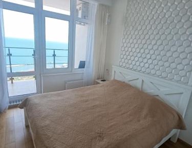 One-Bedroom Apartment with Sea View and Terrace