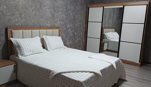 Deluxe Two-Bedroom Apartment with Garden View