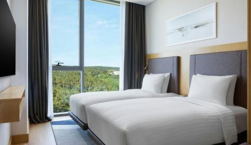Two-Bedroom Apartment with Balcony and Forest View